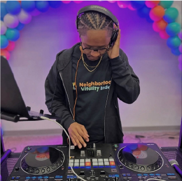 DJ Hall Pass dj-ing at the NVI Homecoming event